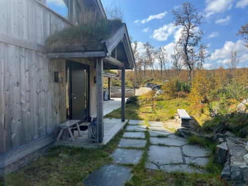 Κήπος έξω από το Spacious, exclusive and modern cabin in Geilo