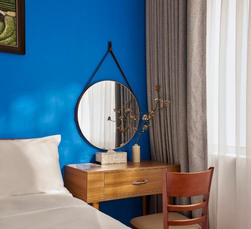 Кровать или кровати в номере Chez Mimosa Homestay