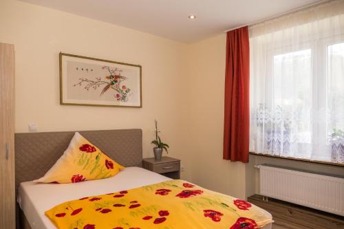 Postel nebo postele na pokoji v ubytování Hotel Lotus