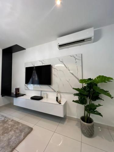 Μια τηλεόραση ή/και κέντρο ψυχαγωγίας στο Embassy Apartments