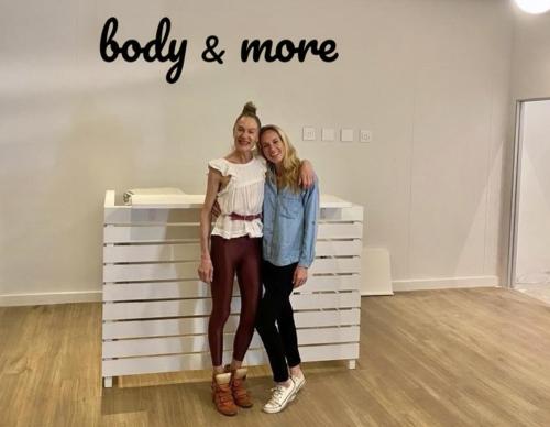 two women standing next to each other in a store at Neighbourgood Newlands in Cape Town