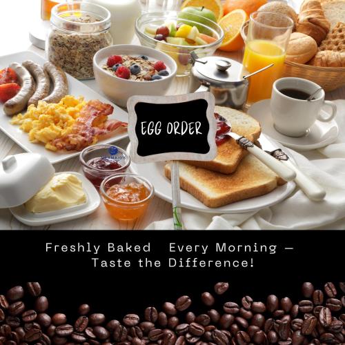 een tafel vol ontbijtproducten met koffie en eieren bij Mermaid Beach Resort in Jomtien Beach