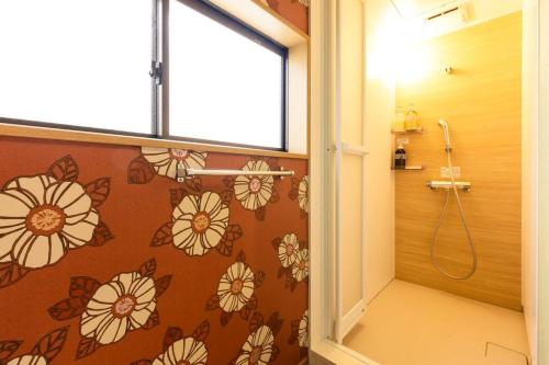 Ένα μπάνιο στο unito 青砥