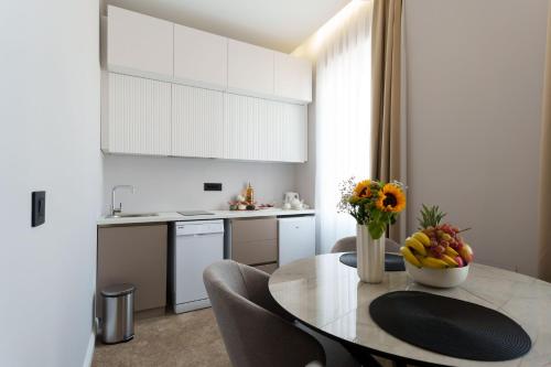 Move In Apartmentsにあるキッチンまたは簡易キッチン