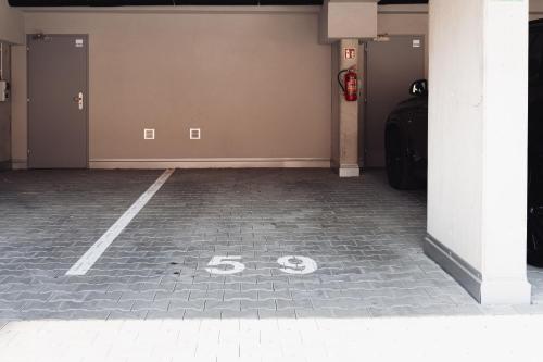 a parking lot with a number on the floor at Rezidence Sadová Zlín in Zlín