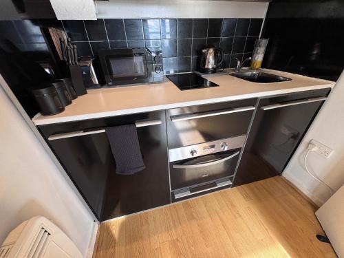 Η κουζίνα ή μικρή κουζίνα στο Cosy Studio Flat in City Center