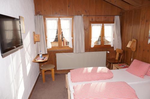 Postel nebo postele na pokoji v ubytování Gasthaus zum Sternen
