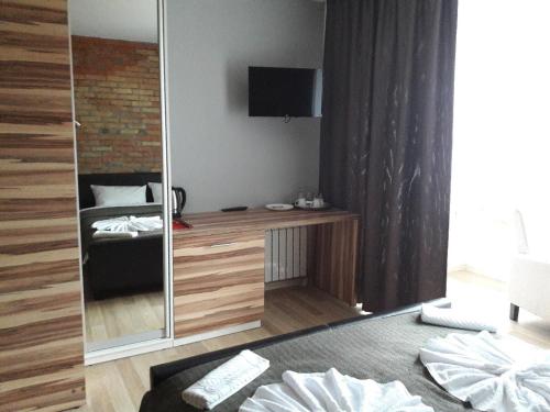 Giường trong phòng chung tại Mini Hotel on Demiivska