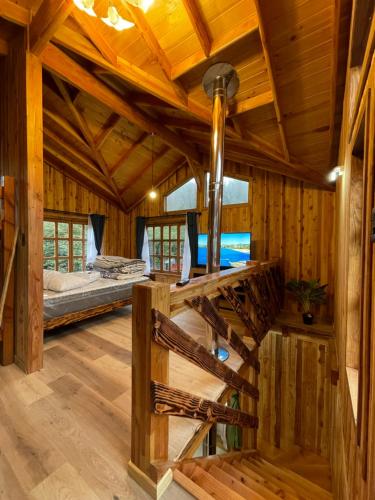 Postel nebo postele na pokoji v ubytování Cabañas bello horizonte