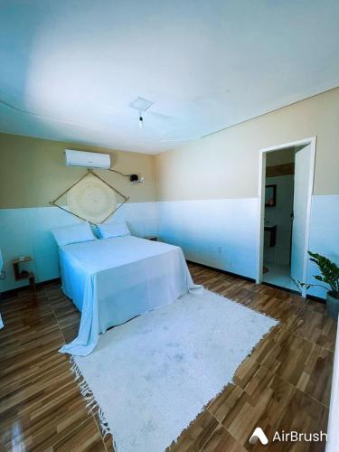 Katil atau katil-katil dalam bilik di casa top com piscina na lagoa dos tambaquis