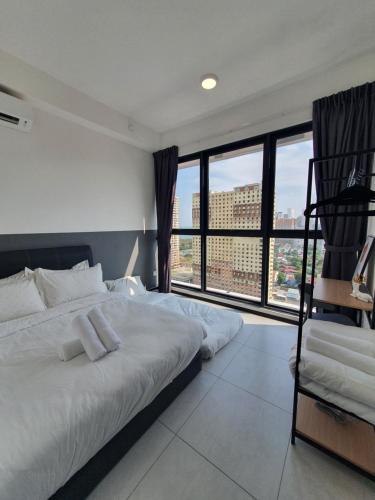 Ένα ή περισσότερα κρεβάτια σε δωμάτιο στο View of Whole Georgetown Sea&City View 3BR-12 a27