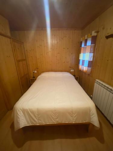 Ένα ή περισσότερα κρεβάτια σε δωμάτιο στο Camping Bungalows La Borda del Pubill