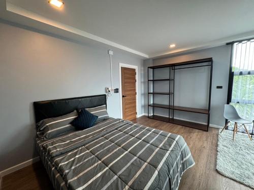Ένα ή περισσότερα κρεβάτια σε δωμάτιο στο NAP IN NAN Poshtel