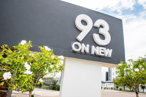 a building with a sign that says on new at Eirini Elegant - Hermes Apartment in Midrand