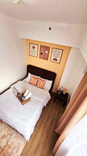 เตียงในห้องที่ Bigg Apol Suite