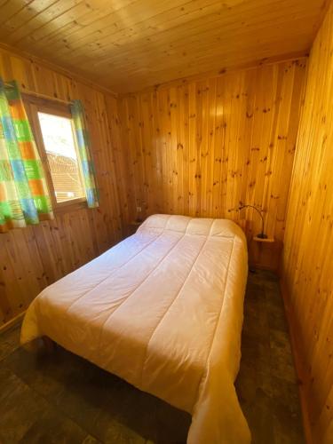Ένα ή περισσότερα κρεβάτια σε δωμάτιο στο Camping Bungalows La Borda del Pubill