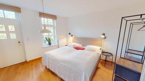 Postel nebo postele na pokoji v ubytování Hafenblick Appartement