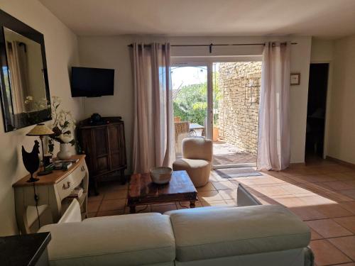 Zona de estar de Le Bastidon des Mésanges