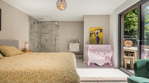 Ένα ή περισσότερα κρεβάτια σε δωμάτιο στο Emma's Atelier