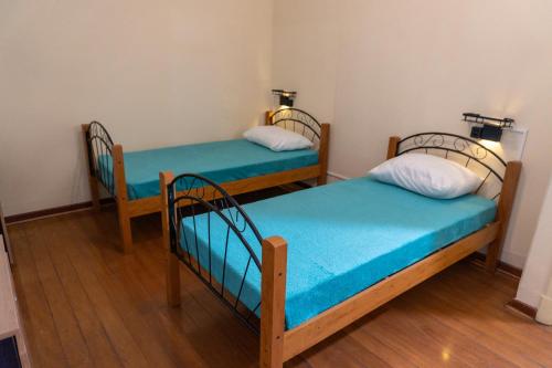 Postel nebo postele na pokoji v ubytování Bixiga Hostel