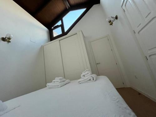 Ένα ή περισσότερα κρεβάτια σε δωμάτιο στο Casa Lucero