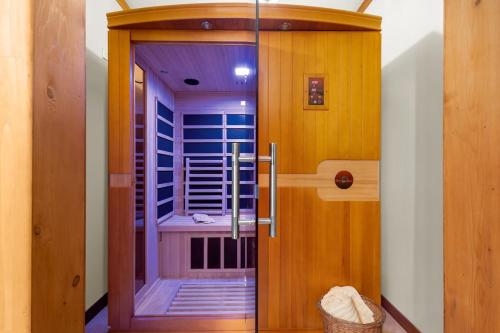 a bathroom with a shower with a glass door at Cosy Lake Paradise 4-Bed Retreat Pet Friendly in Rothesay