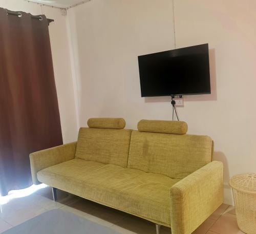 TV a/nebo společenská místnost v ubytování OneLove Apartment-La Gaulette