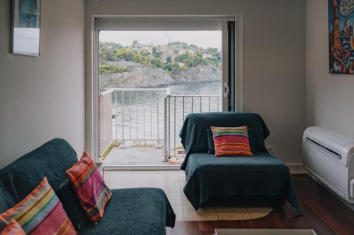 Posedenie v ubytovaní Splendide appartement climatisé avec vue sur mer et clocher - Parking et WIFI