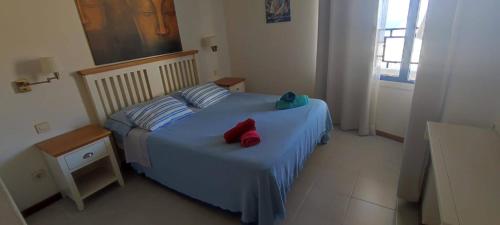 Ένα ή περισσότερα κρεβάτια σε δωμάτιο στο Ocean view apartment in Taurito, Mogan - Top Floor