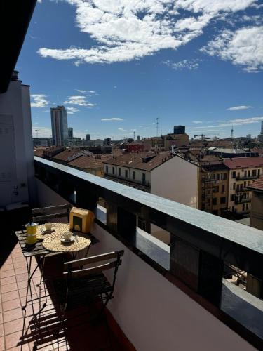 Appartamento Isola- Attico con Balcone