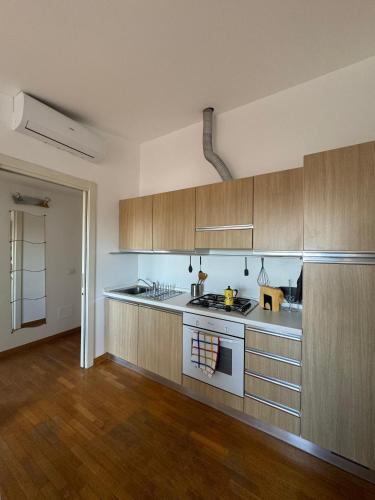 Appartamento Isola- Attico con Balcone