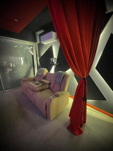 Χώρος καθιστικού στο L unique Cinéma Room