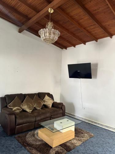 TV a/nebo společenská místnost v ubytování Casa grande parque central