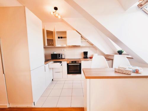 Kuchyň nebo kuchyňský kout v ubytování Bucharest Central E Apartment