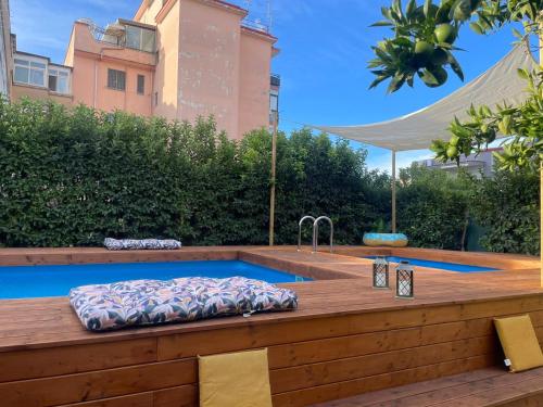 a hot tub in the backyard of a house at Sky and Green Luxury Apartament in Boscoreale