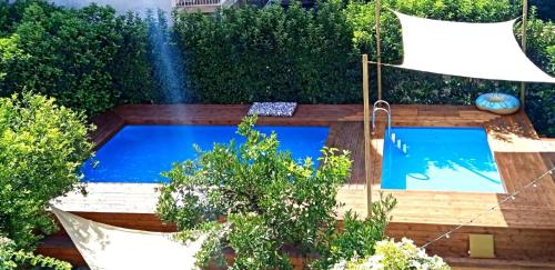 Bazén v ubytování Pompei Home Apartament nebo v jeho okolí