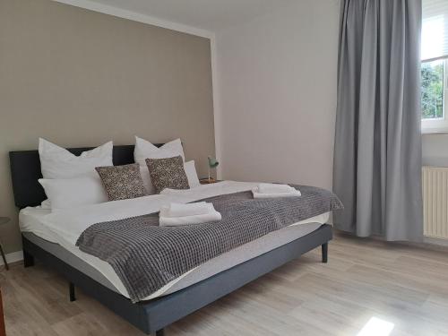 Postel nebo postele na pokoji v ubytování Apartment Seeblick