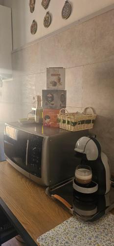 a toaster oven sitting on top of a counter at Ferrara1 in Ferrara