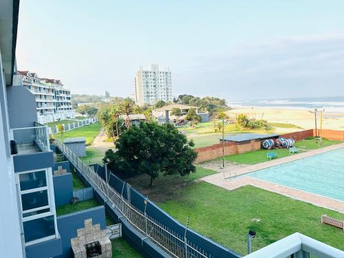 a view of the beach from a balcony of a building at Boulevard 208 in Margate