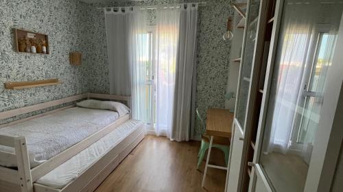 Posteľ alebo postele v izbe v ubytovaní Sanlúcar Bajo de Guía PG Apartamentos