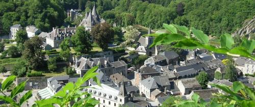 a view of a town with houses and trees at Apartment with beautiful views near Durbuy in Durbuy