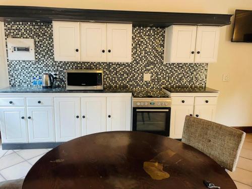 Dapur atau dapur kecil di Melodie Guest House