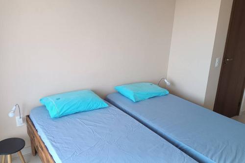 Katil atau katil-katil dalam bilik di Apartamento com varanda no centro de Aperibé