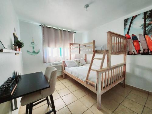 Postel nebo postele na pokoji v ubytování Aquatika Escape Sand and Pools 1st floor