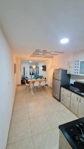Kuchyň nebo kuchyňský kout v ubytování Apartamentos La Flora