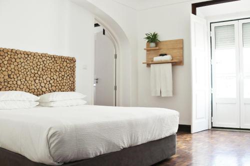 Katil atau katil-katil dalam bilik di ZOETIC sustainable rooms