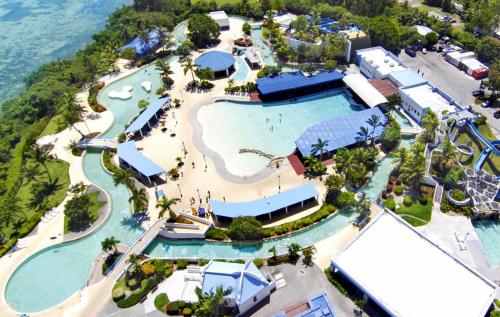 an aerial view of the water park at the resort at Hoshino Resorts RISONARE Guam in Tamuning