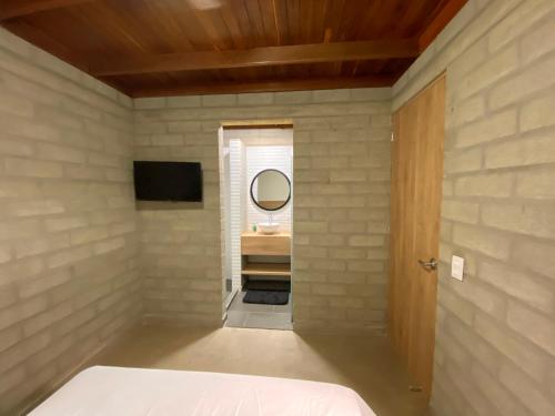 Una cama o camas en una habitación de Hospedaje San Diego