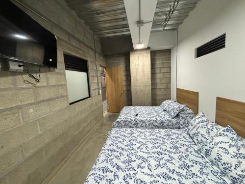 Una cama o camas en una habitación de Hospedaje San Diego