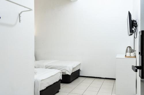 Кровать или кровати в номере Ihome Boutique Hotel